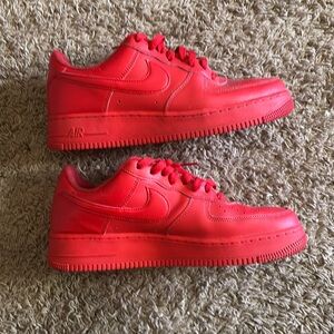 Bold and sleek, these all-red Air Force 1s, comfort and durable design.